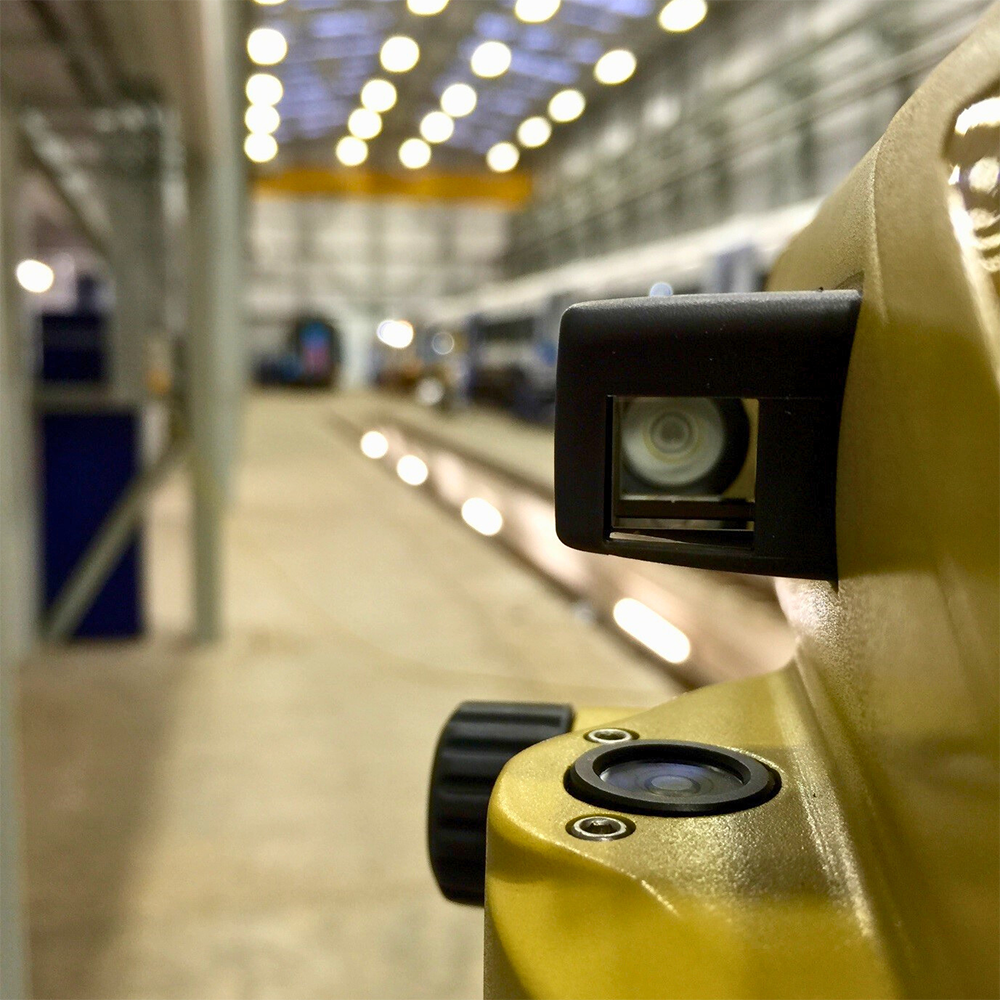 Close-up of a surveyor’s level with the bubble centred, symbolising precision