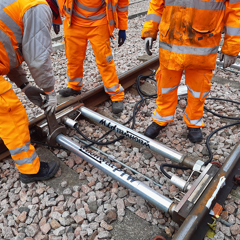 Trainee installing a PTW system during on-site training session